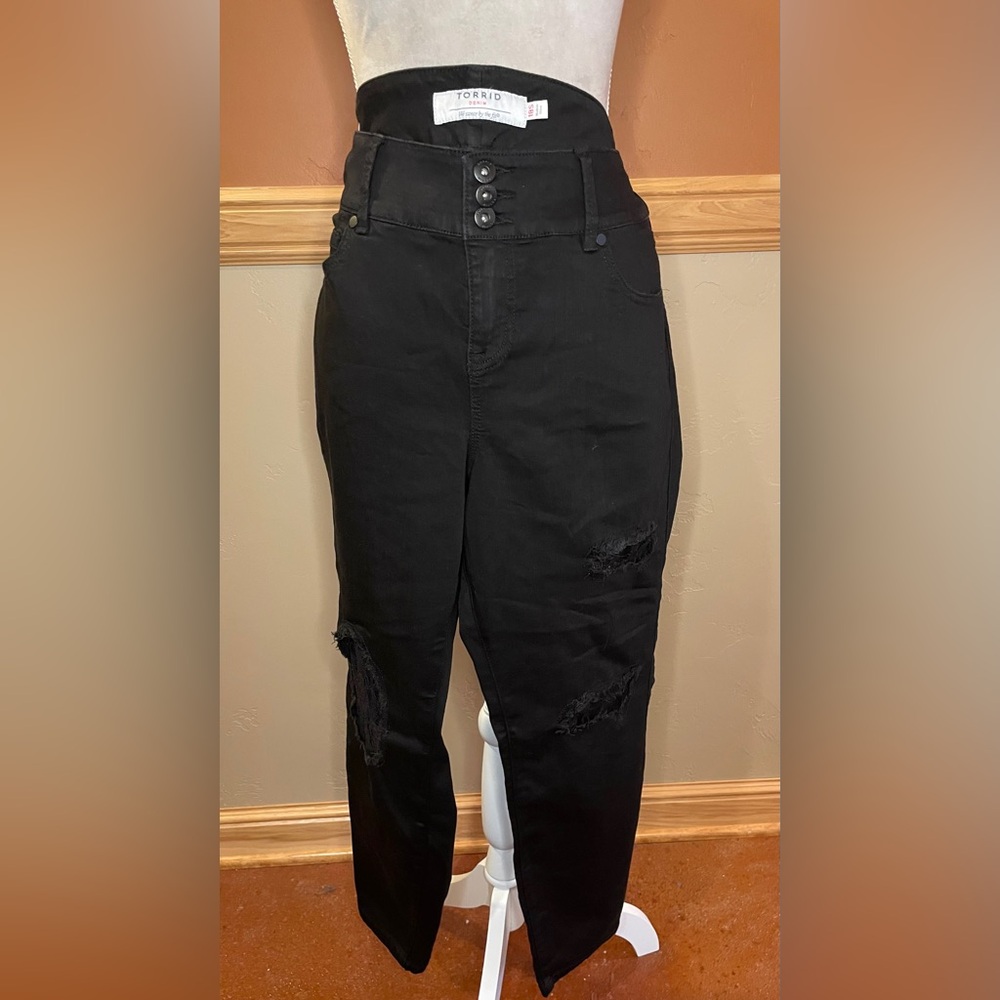 Black distressed jeans with lace inserts